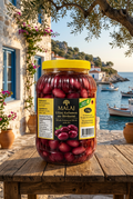 A 2 kg glass jar of Malaj Ullinj Kalamon me Berthame (whole Kalamon olives) with a yellow lid and a black and yellow label, shown on a white background within a mobile app screenshot.